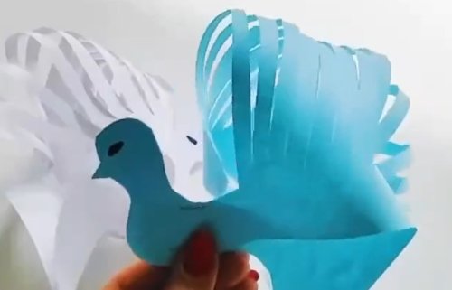 זוג יונים: יצירה מושלמת מחתיכת נייר